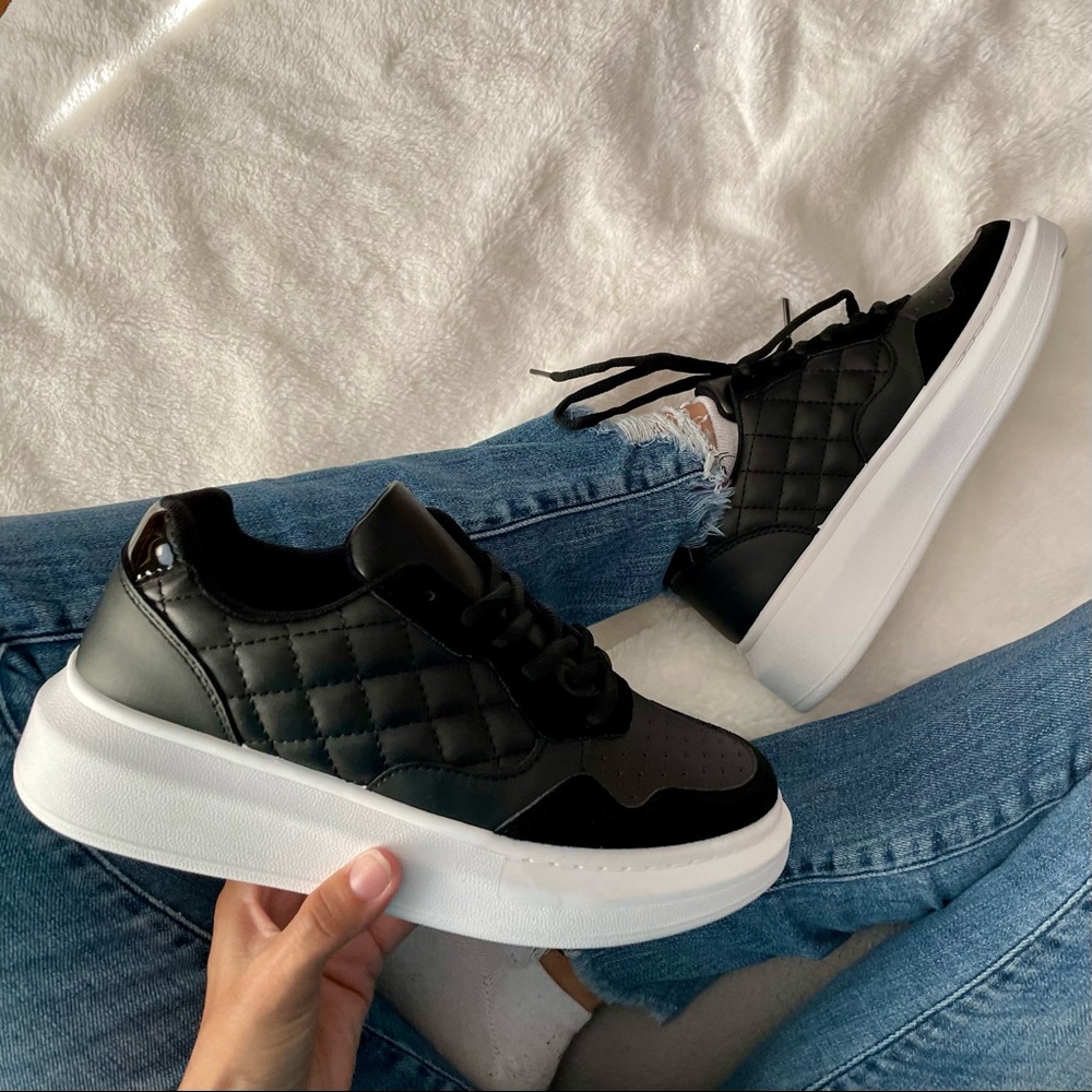 Black platform sneakers